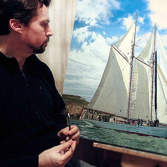 Marine Artist Mark Woollacott working on a painting of schooner Coral of Cowes, top uk marine art painters