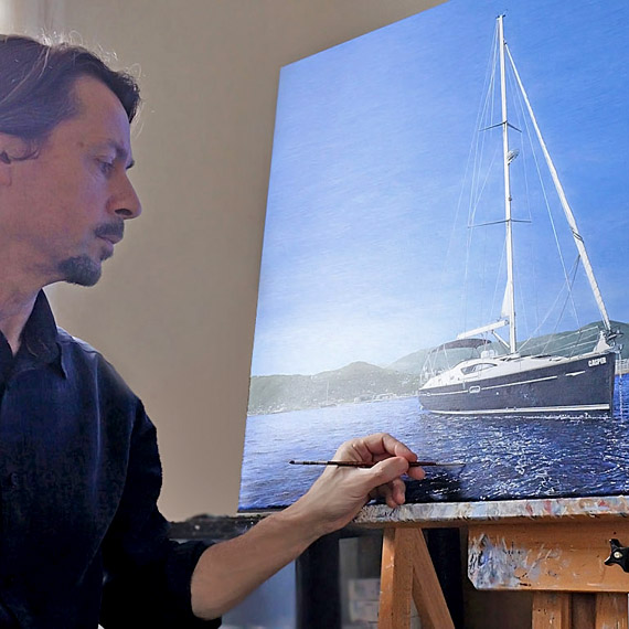Marine artist Mark Woollacott at the easel working on a painting, top artist biography examples