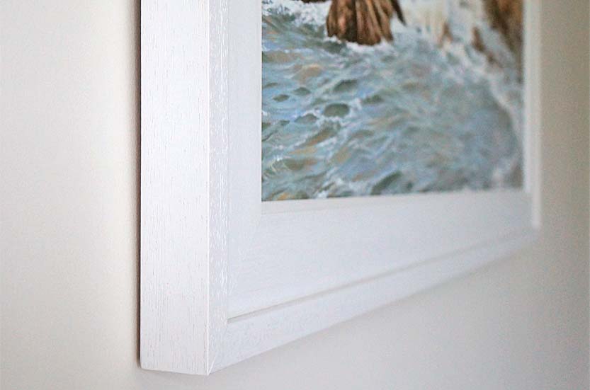 an angled corner view of a wave painting by Mark Woollacott