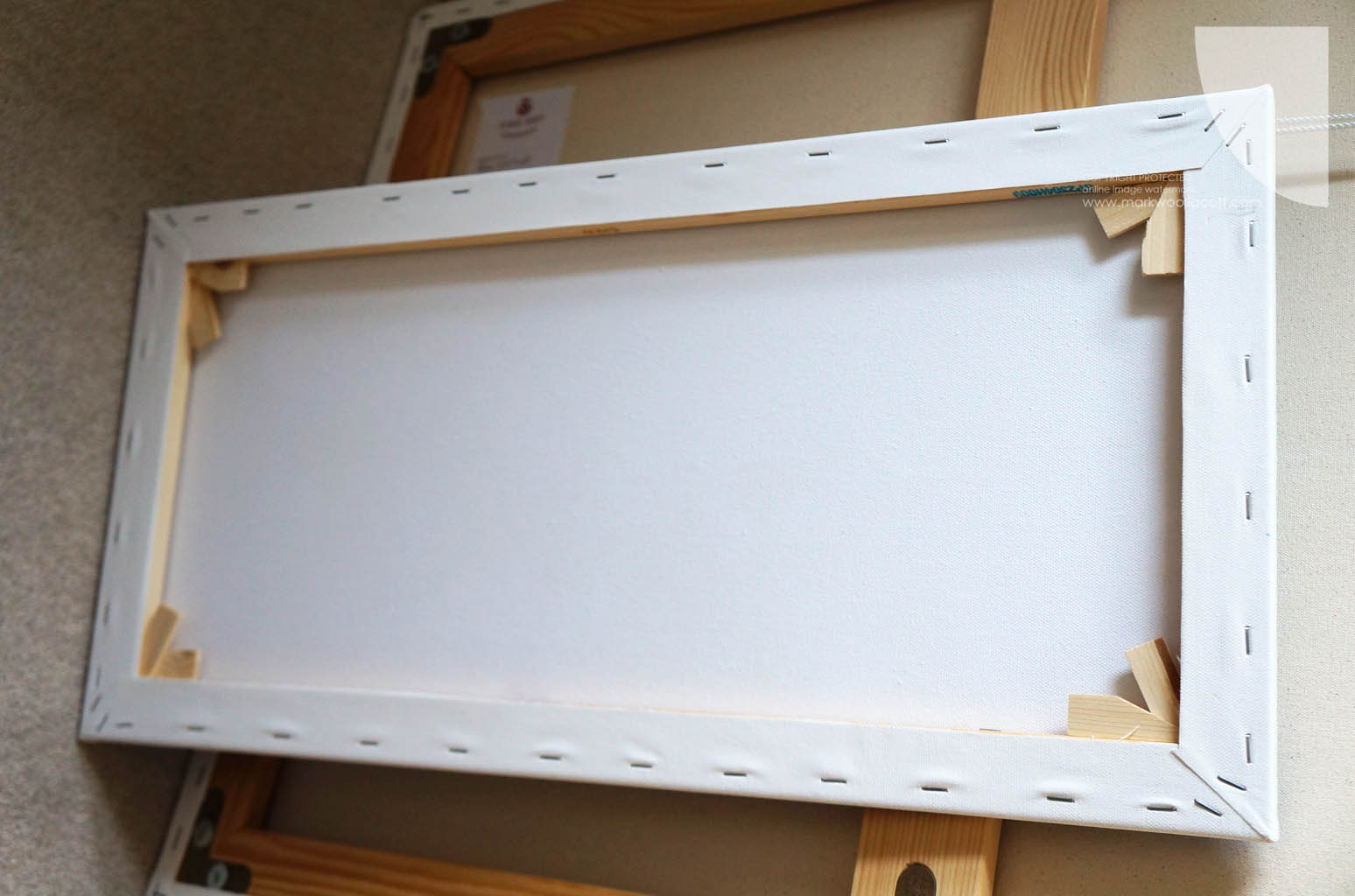 The Light From Above painting showing the reverse side of canvas